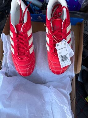 adidas Men’s Red Sneakers with White Stripes